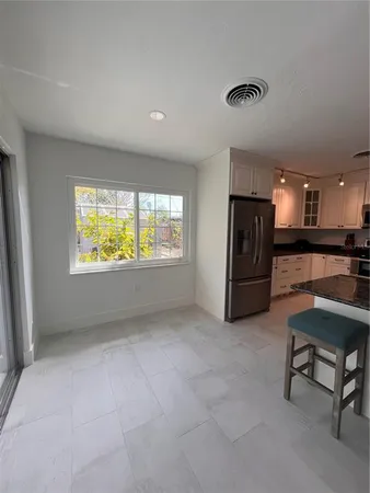 a view of a livingroom and a chair