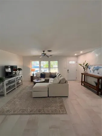 a living room with furniture and a couch