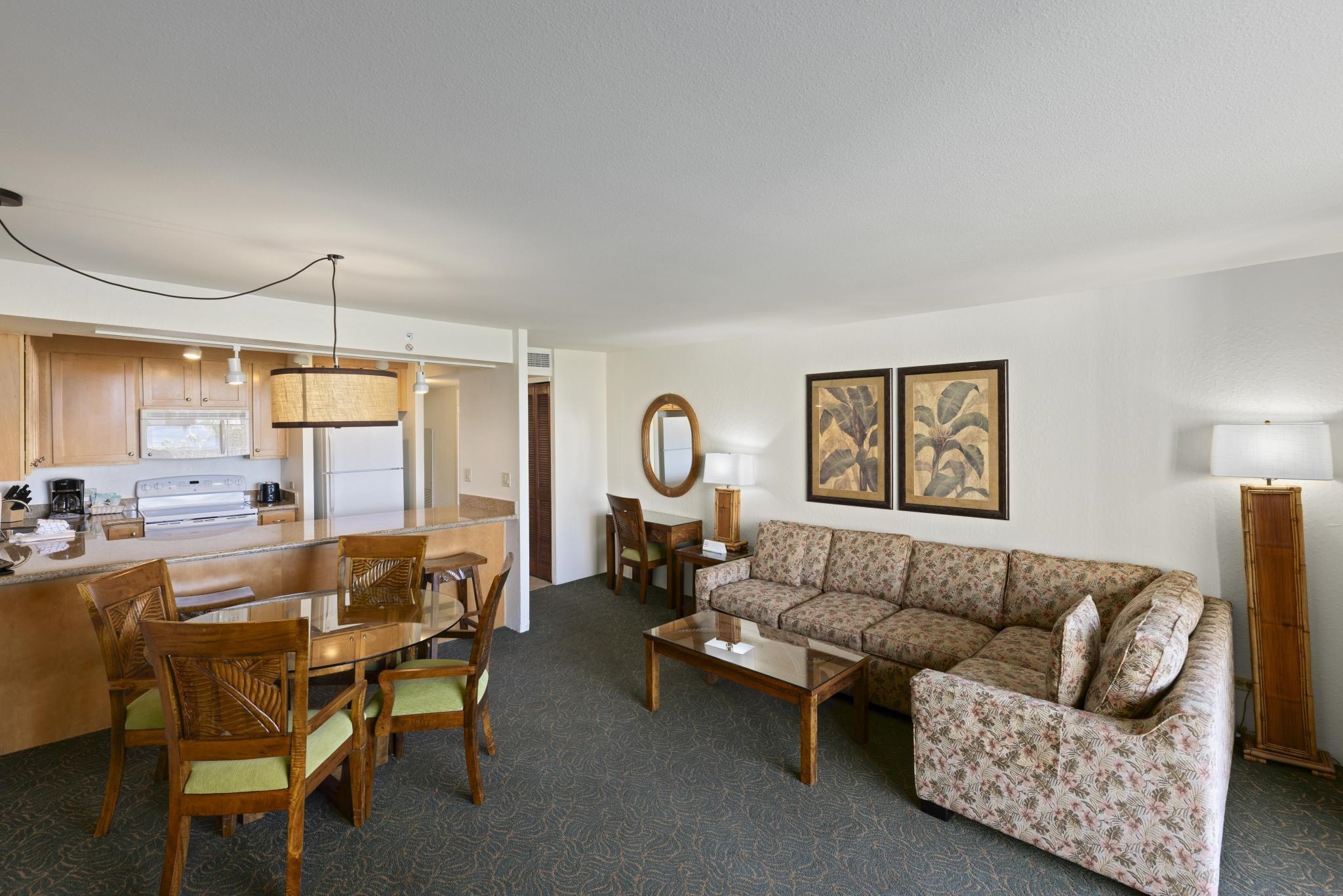 3445 Lower Honoapiilani Road, Unit 431 Lahaina, HI 96761 - Photo 5 of 32 a living room with furniture a rug and a window