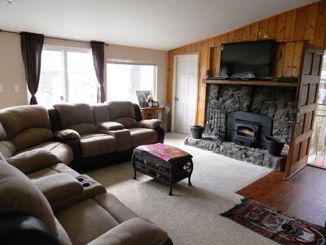 Living Room Features Cozy Fireplace With Insert