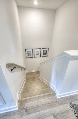 a view of a hallway with a white walls