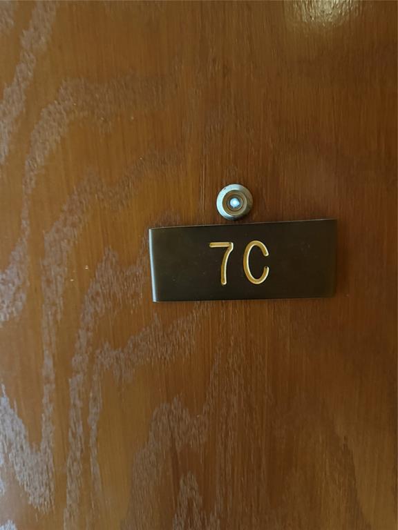 19707 Turnberry Way, Unit 7C Aventura, FL 33180 - Photo 3 of 40 a view of door with shower