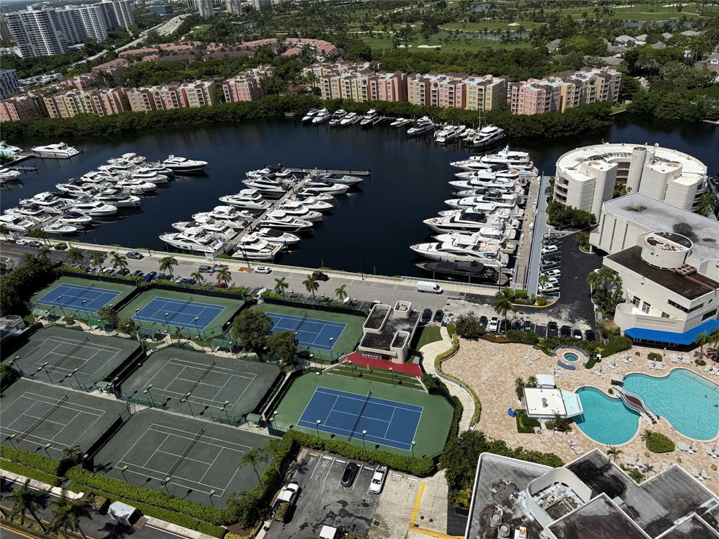19707 Turnberry Way, Unit 7C Aventura, FL 33180 - Photo 36 of 40 an aerial view of a houses with outdoor space