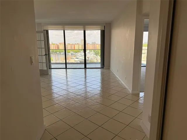 a view of an empty room and window