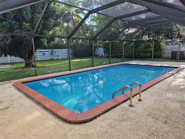 a view of a couches in backyard of house
