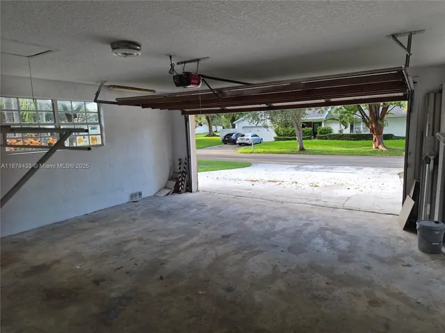an aerial view of a house having yard