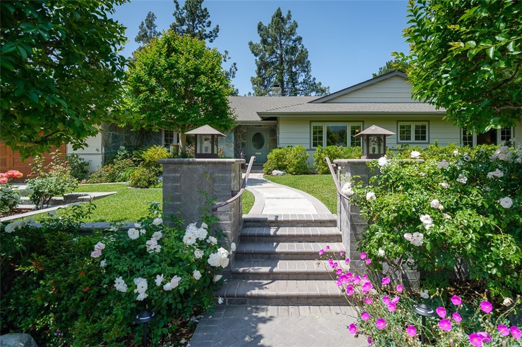 1563 Meadowbrook Road Altadena, CA 91001 - Photo 1 of 1 a front view of a house with a yard and potted plants