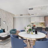 a living room with furniture and a table