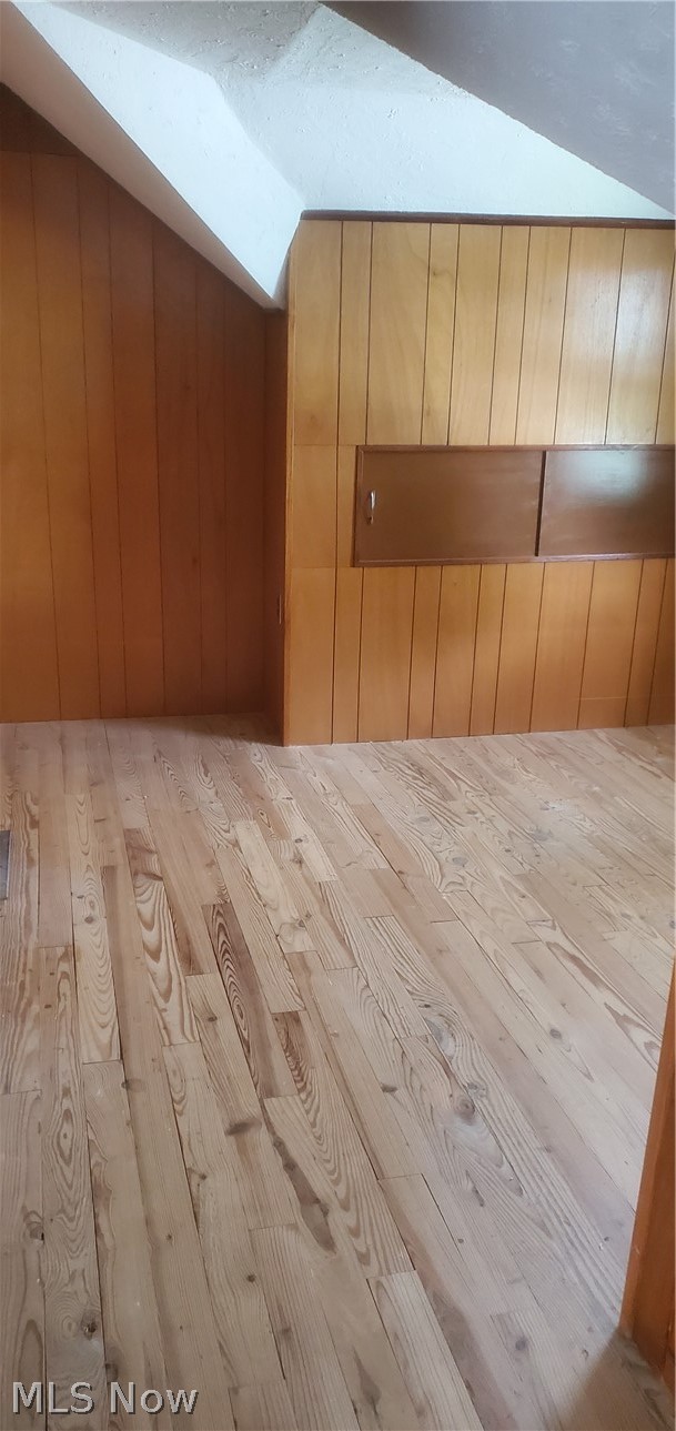 30037 Regent Road Wickliffe, OH 44092 - Photo 11 of 23 Bonus room featuring light hardwood / wood-style floors and vaulted ceiling