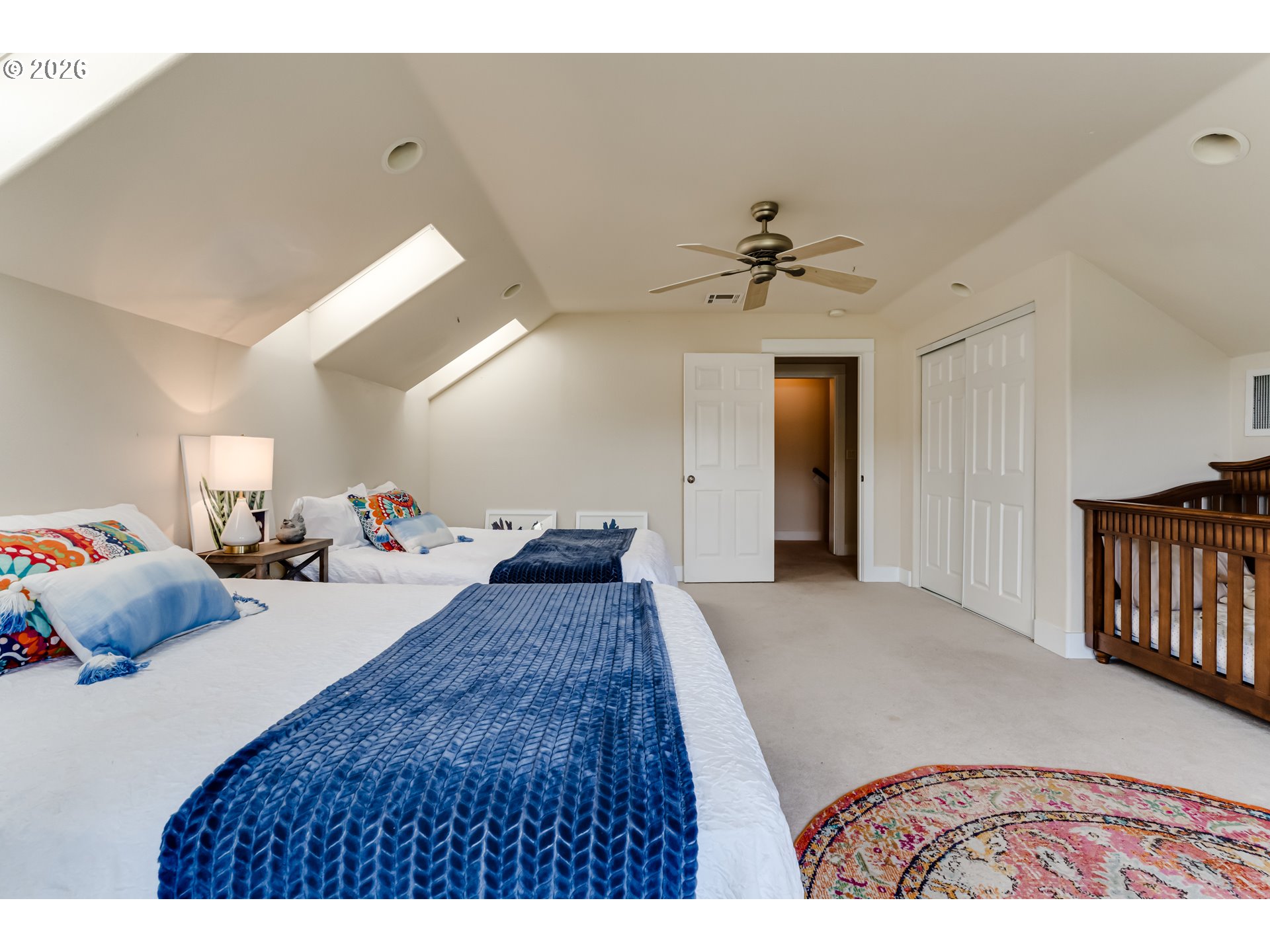 34386 Mathews Road Eugene, OR 97405 - Photo 45 of 48 a bedroom with furniture and a chandelier