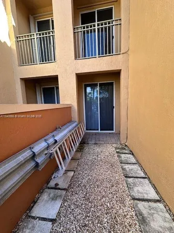a view of a house with entryway and stairs