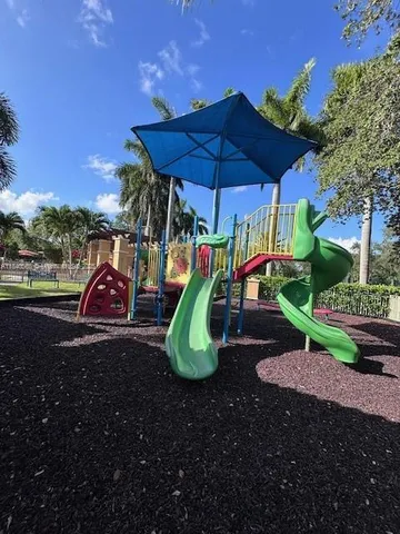 a view of a park with slide