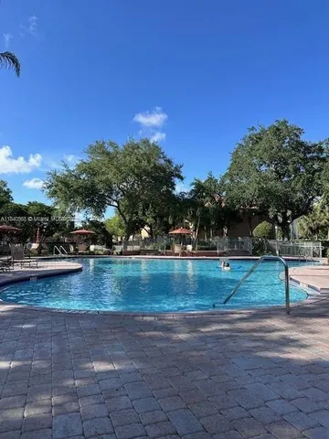 a view of a yard with an trees