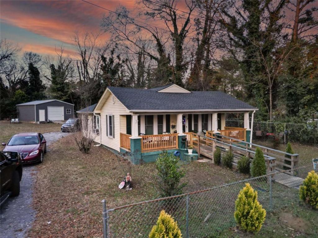 525 East 14th Street Rome, GA 30161 - Photo 2 of 12 a front view of a house with patio