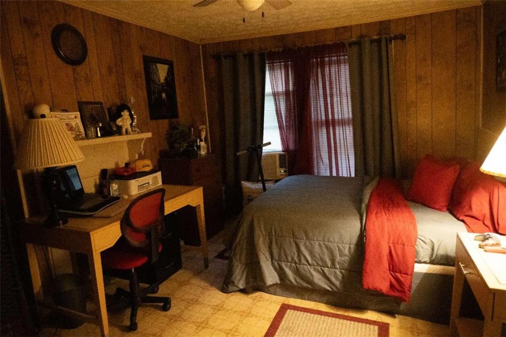 525 East 14th Street Rome, GA 30161 - Photo 8 of 12 a bedroom with a bed and closet