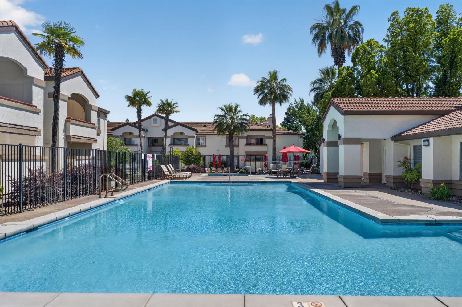 8020 Walerga Road, Unit 1140 Antelope, CA 95843 - Photo 35 of 37 a swimming pool view with a seating space and a garden
