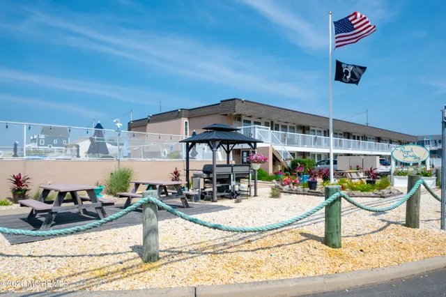 a view of a swimming pool with chairs