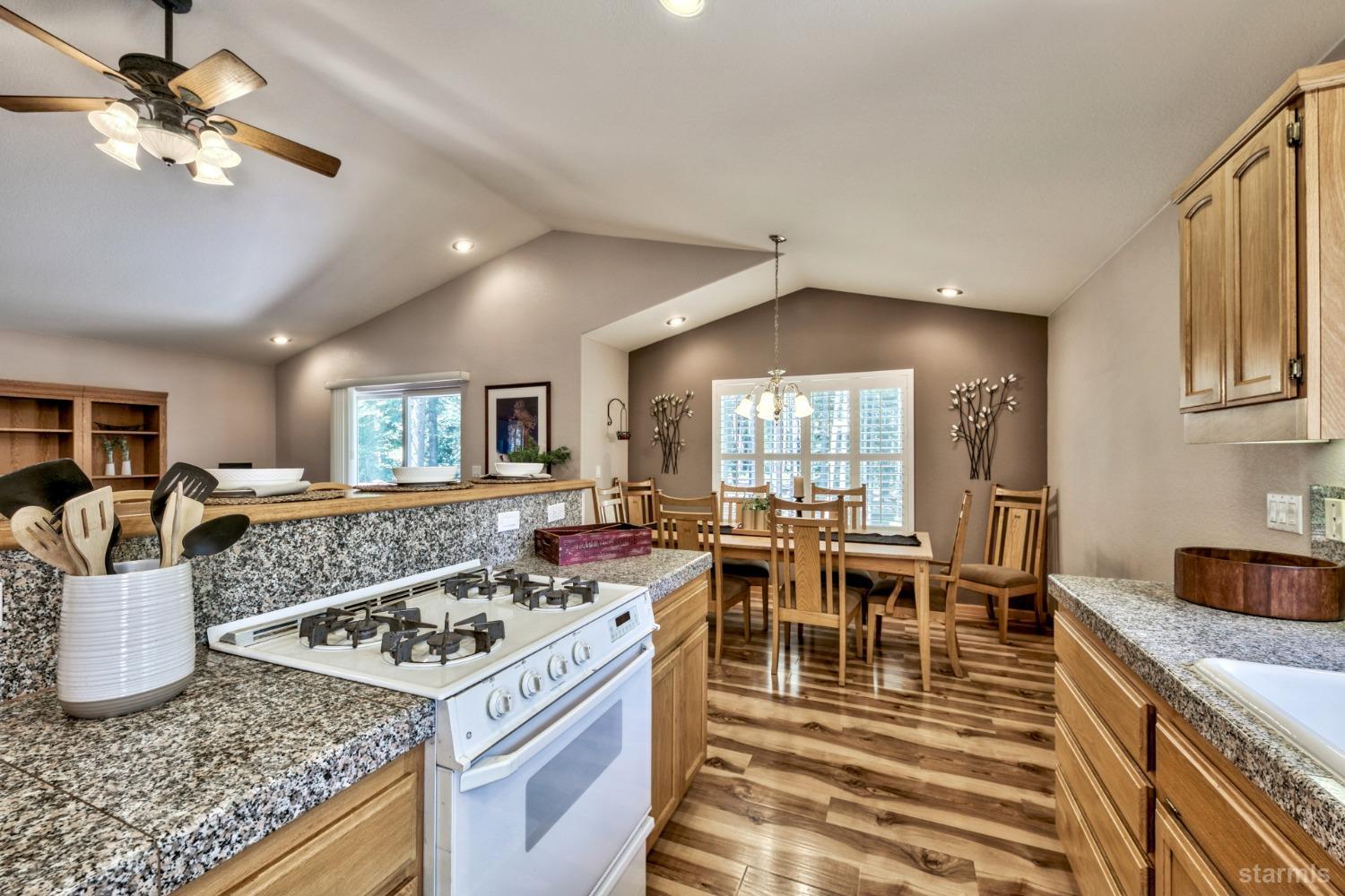 1569 Aztec Way South Lake Tahoe, CA 96150 - Photo 11 of 22 a kitchen with a stove and cabinets