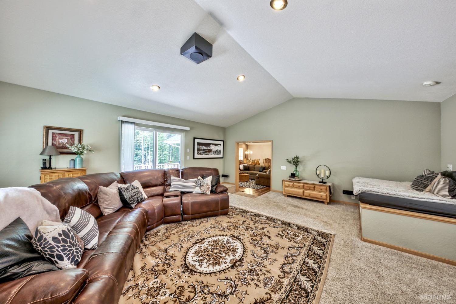 1569 Aztec Way South Lake Tahoe, CA 96150 - Photo 12 of 22 a living room with furniture and a couch