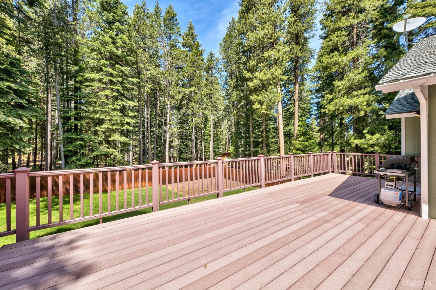 1569 Aztec Way South Lake Tahoe, CA 96150 - Photo 16 of 22 a view of a deck with a large trees