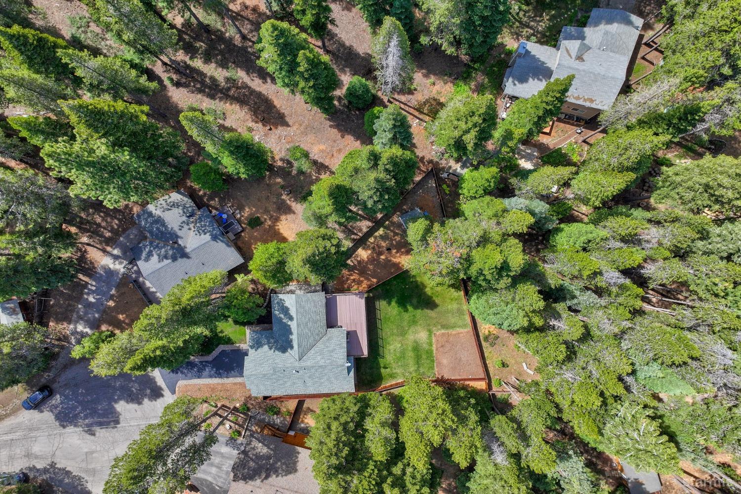 1569 Aztec Way South Lake Tahoe, CA 96150 - Photo 22 of 22 an aerial view of a house with a yard