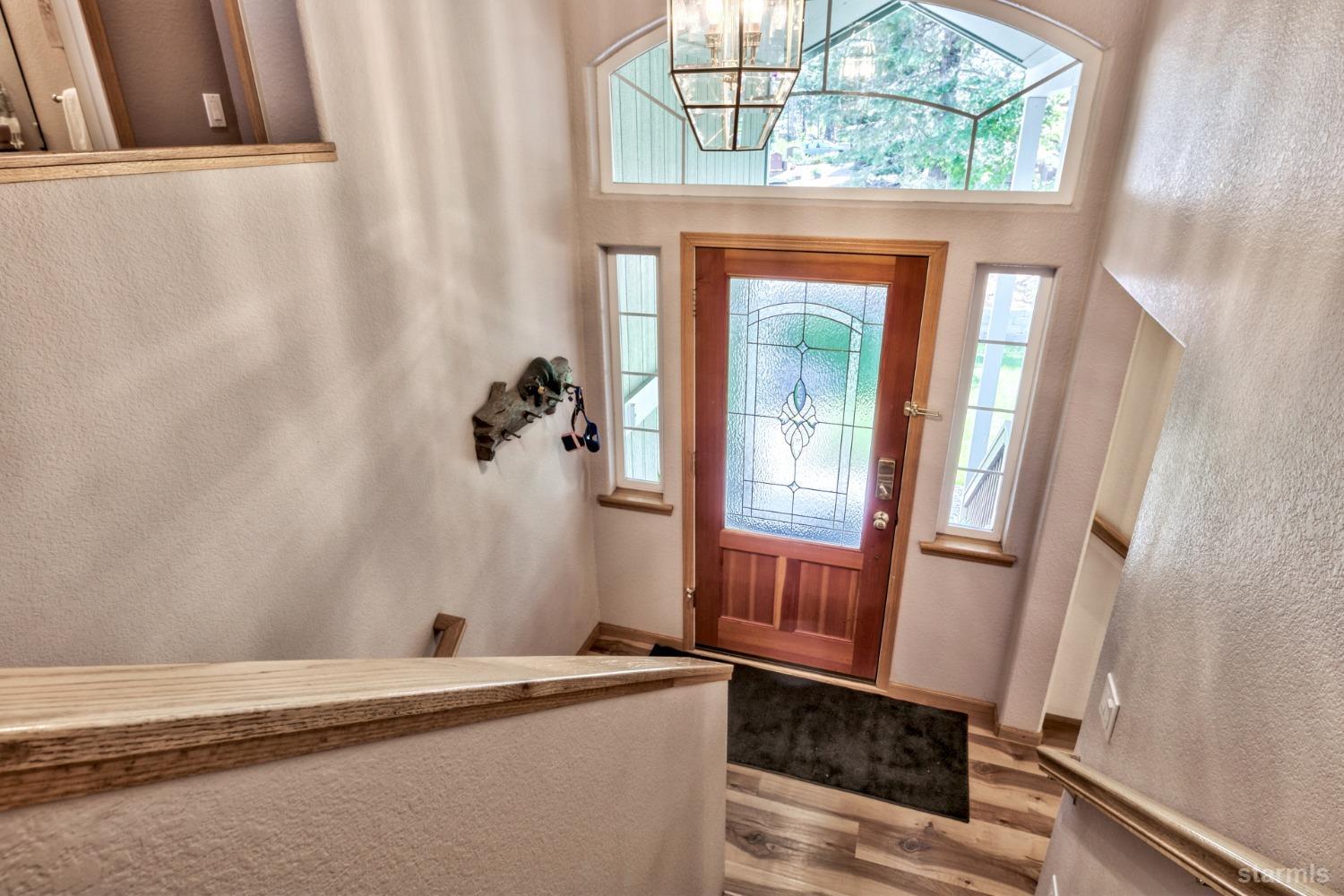1569 Aztec Way South Lake Tahoe, CA 96150 - Photo 6 of 22 a view of an entryway with a mirror