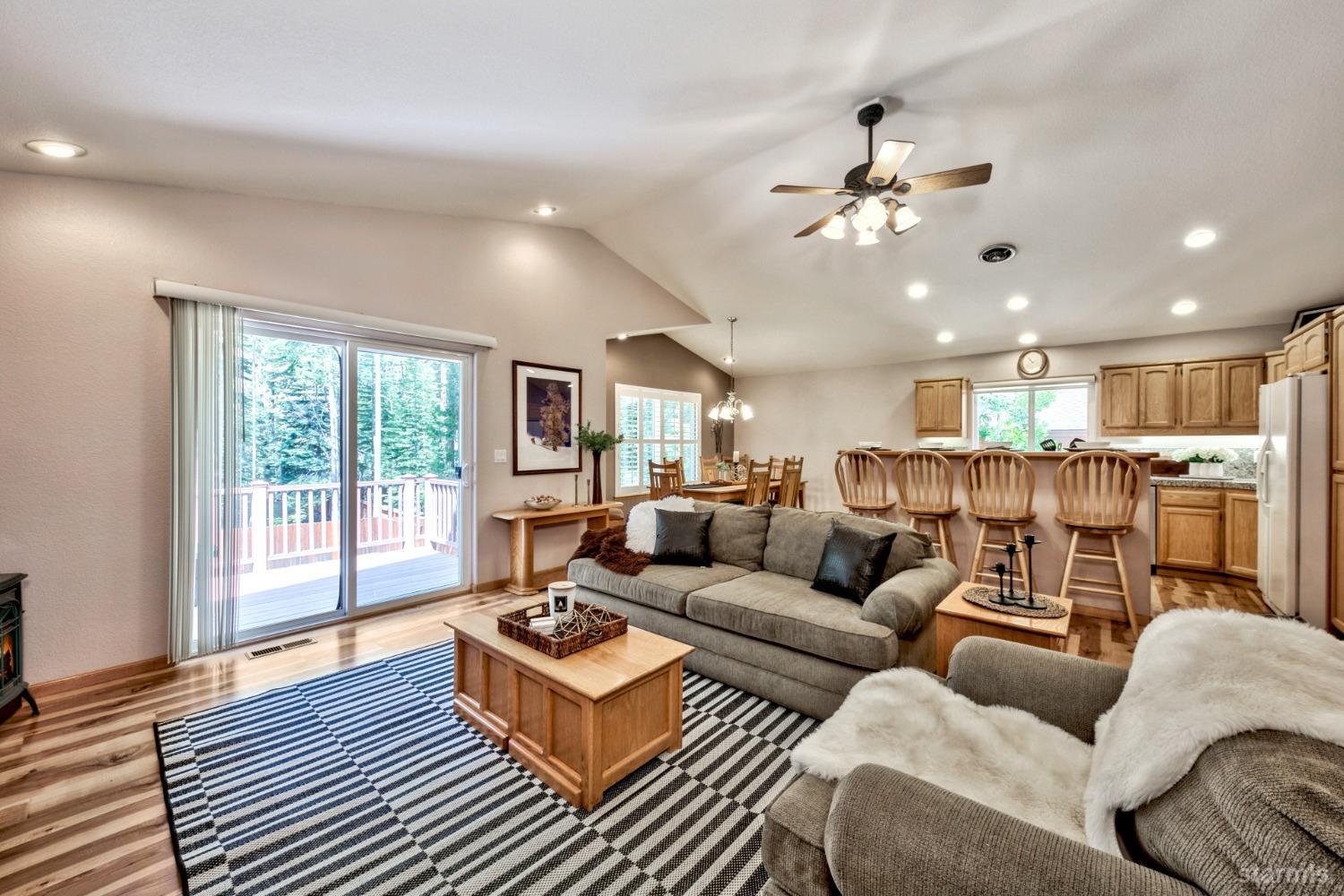 1569 Aztec Way South Lake Tahoe, CA 96150 - Photo 8 of 22 a living room with furniture and a large window