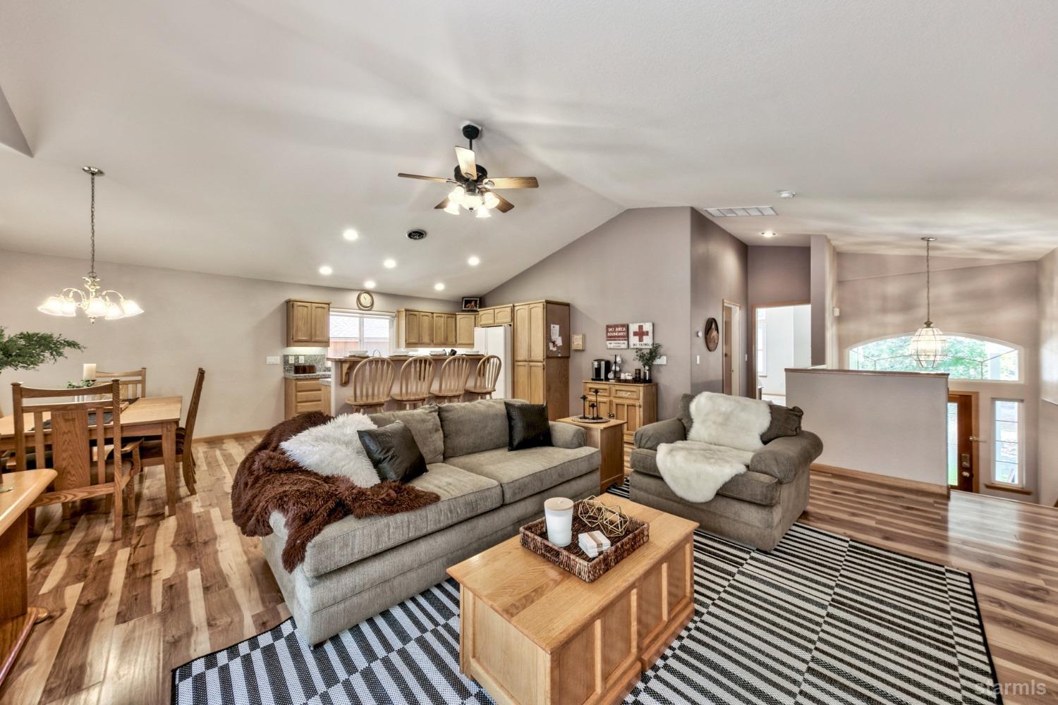 1569 Aztec Way South Lake Tahoe, CA 96150 - Photo 9 of 22 a living room with furniture and kitchen view