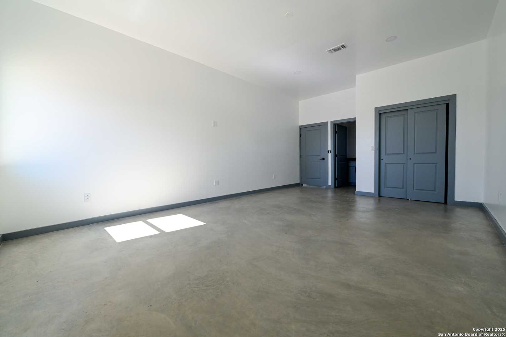1003 West Galveston Street Marfa, TX 79843 - Photo 19 of 23 a view of an empty room and window