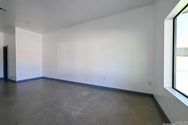an empty room with a window