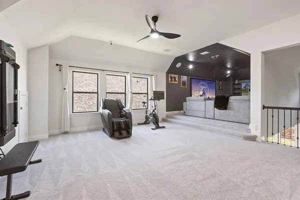 a view of a livingroom with furniture and windows