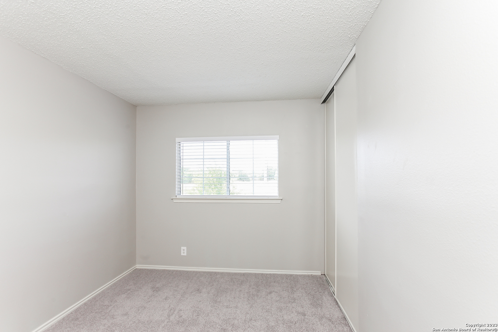 6135 Lyndell Spring San Antonio, TX 78244 - Photo 10 of 17 an empty room with a window