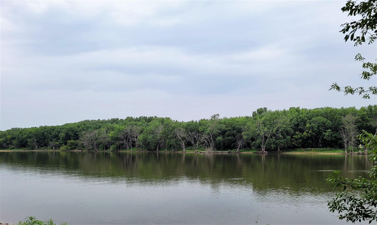 7504 North River Road Byron, IL 61010 - Photo 13 of 46 a view of a lake