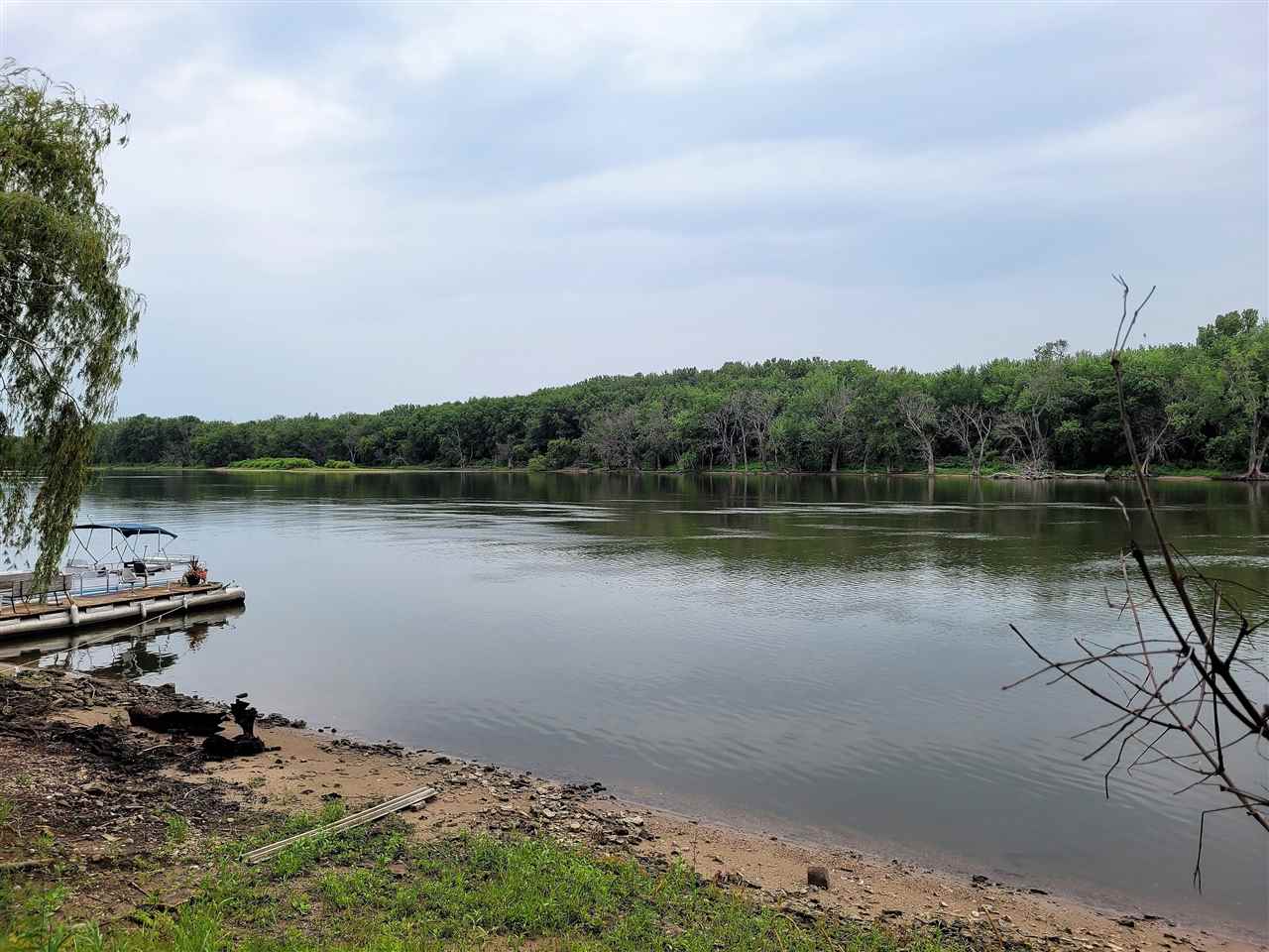 7504 North River Road Byron, IL 61010 - Photo 15 of 46 a view of a lake with a mountain