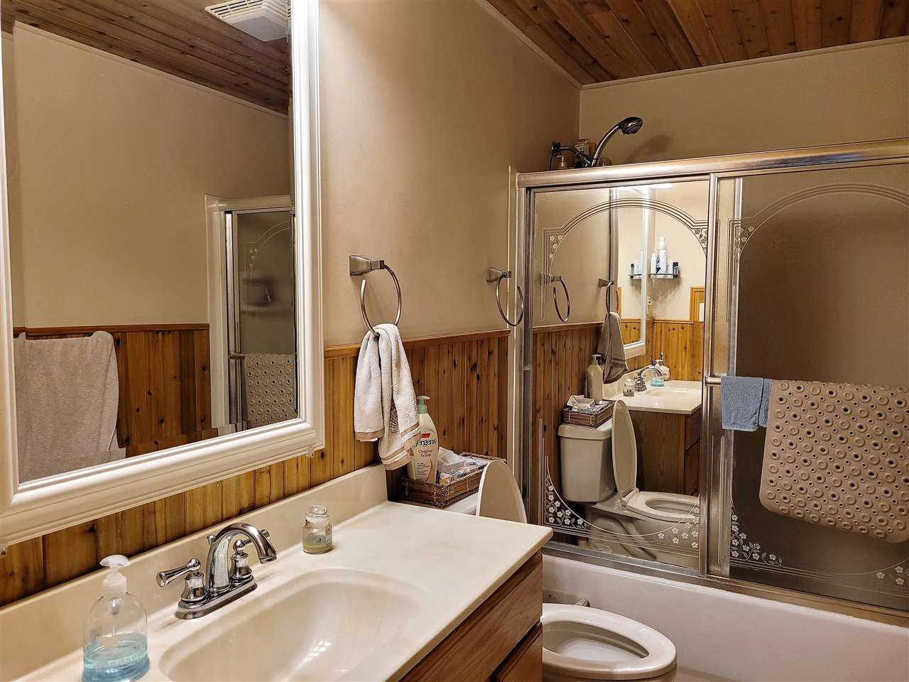 7504 North River Road Byron, IL 61010 - Photo 33 of 46 a bathroom with a sink and a mirror