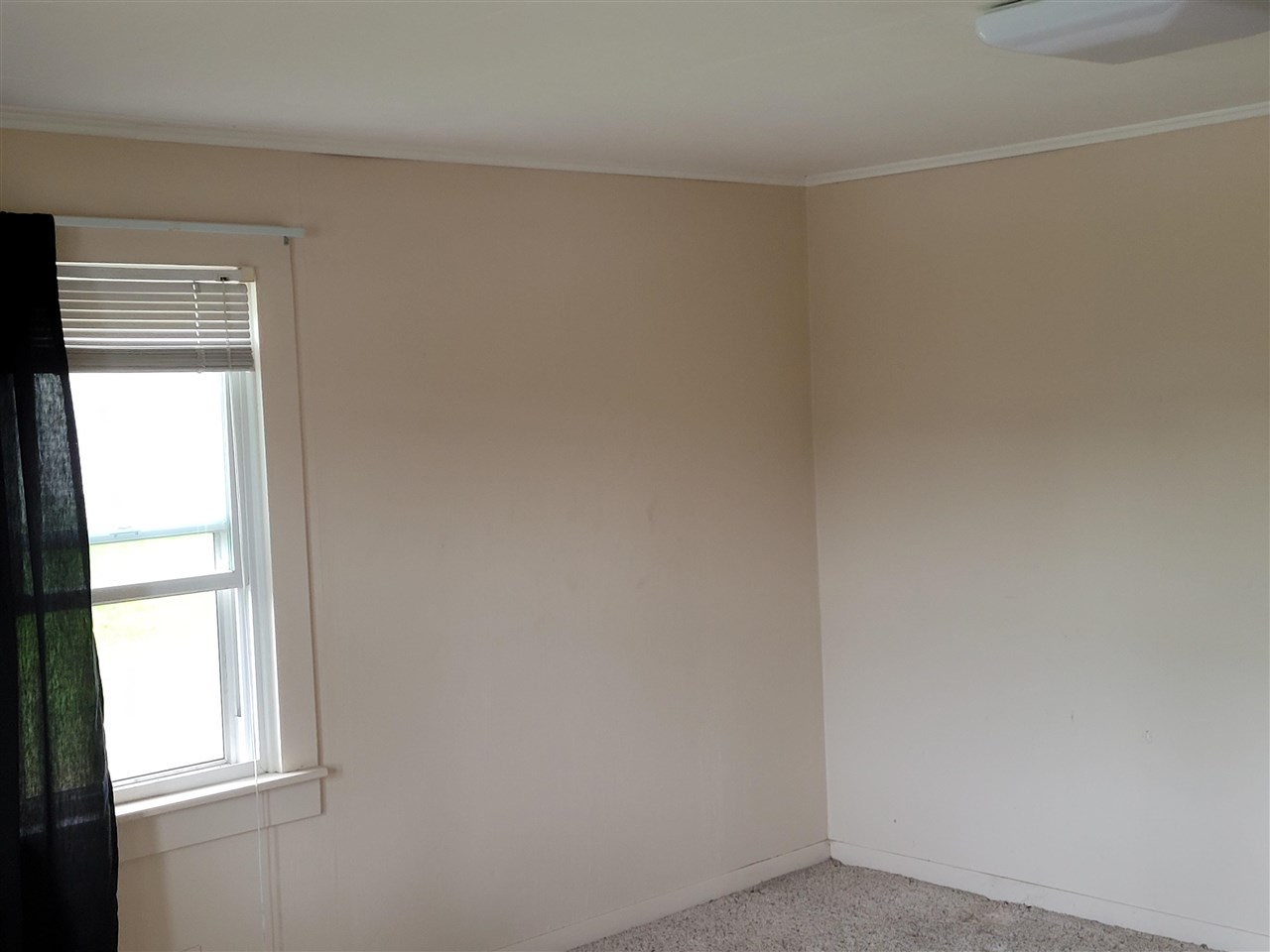 7504 North River Road Byron, IL 61010 - Photo 36 of 46 a view of an empty room with a window