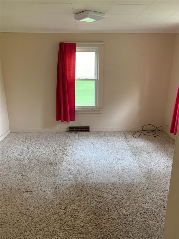 7504 North River Road Byron, IL 61010 - Photo 46 of 46 a view of a room with windows