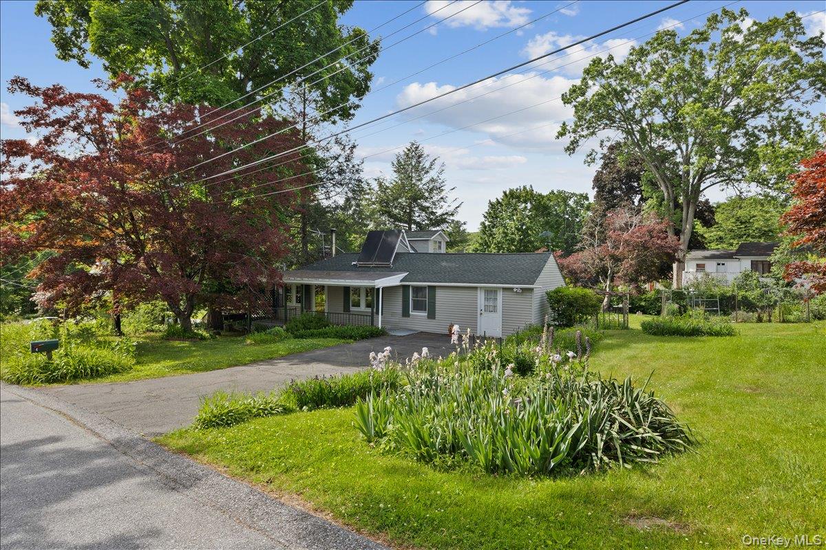 4 Brandon Road Brewster, NY 10509 - Photo 2 of 38 Ranch-style residence featuring light gray siding and a dark green shingle roof