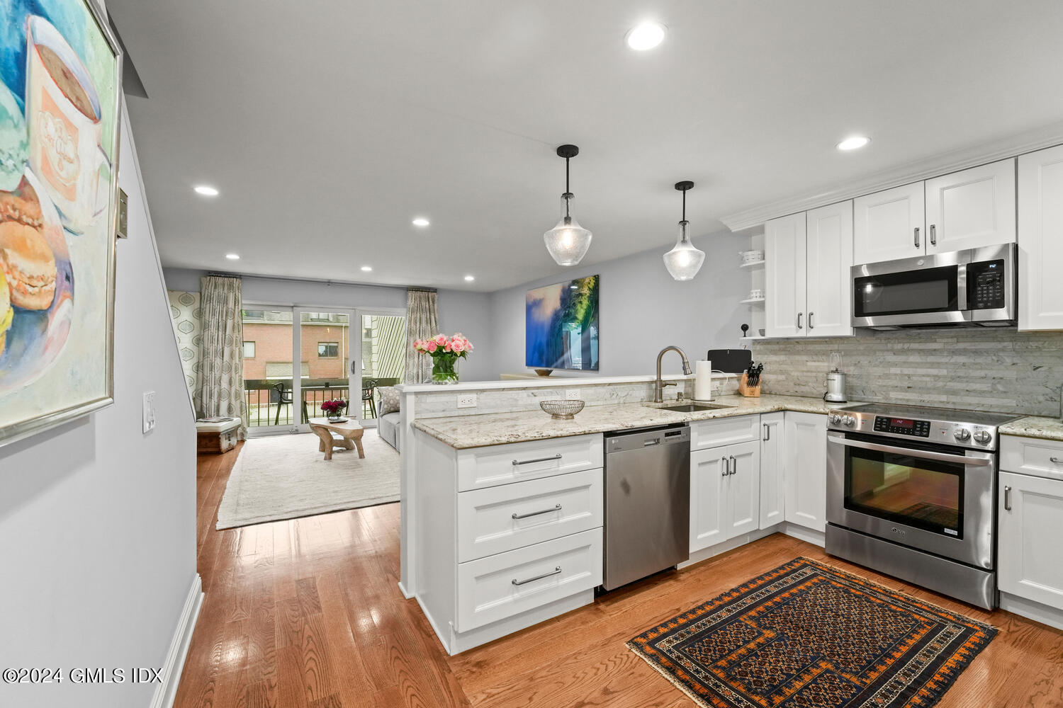 9 River Road, Unit 418 Cos Cob, CT 06807 - Photo 4 of 41 Kitchen view to living room