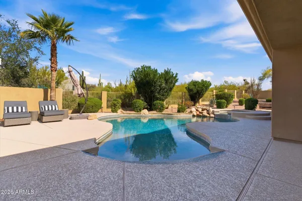 a view of outdoor space with swimming pool