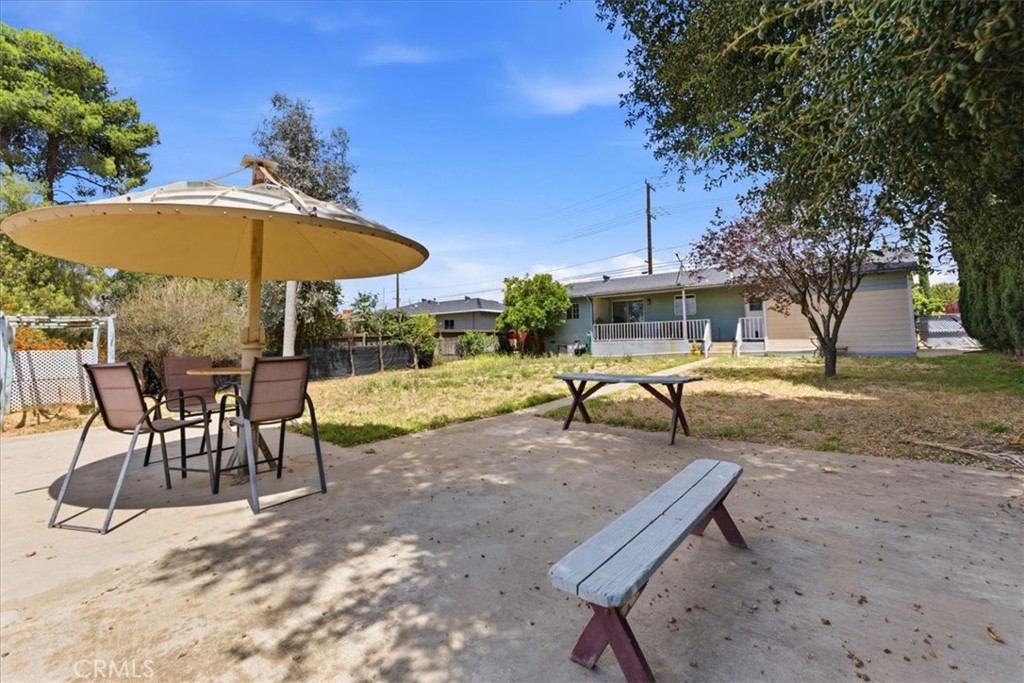 34863 Wildwood Canyon Road Yucaipa, CA 92399 - Photo 17 of 22 a view of a backyard with a sitting area