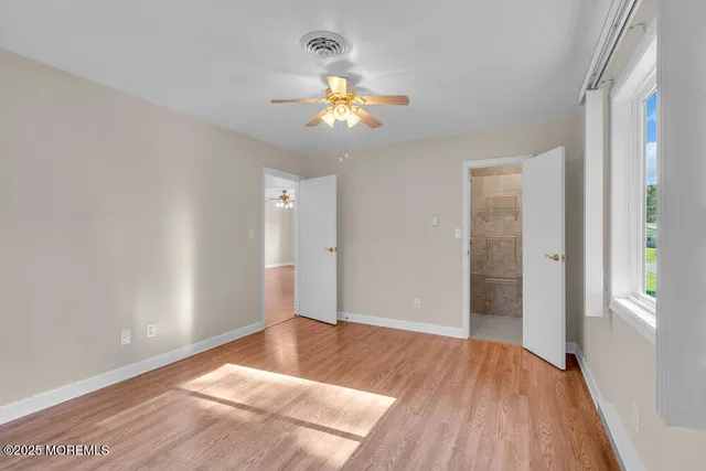 a view of entryway with bathroom
