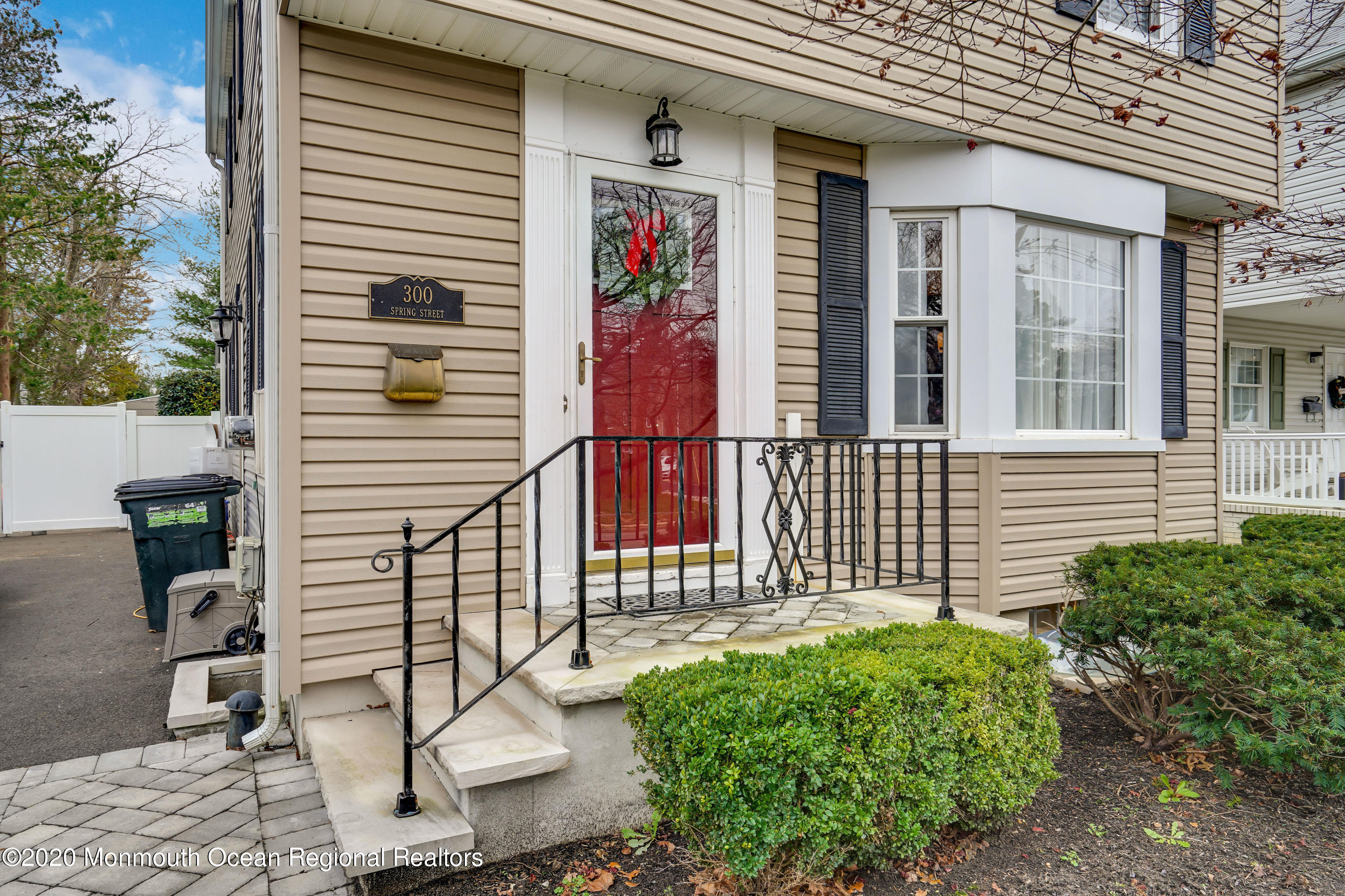 300 Spring Street Red Bank, NJ 07701 - Photo 1 of 25 a view of a house with a porch