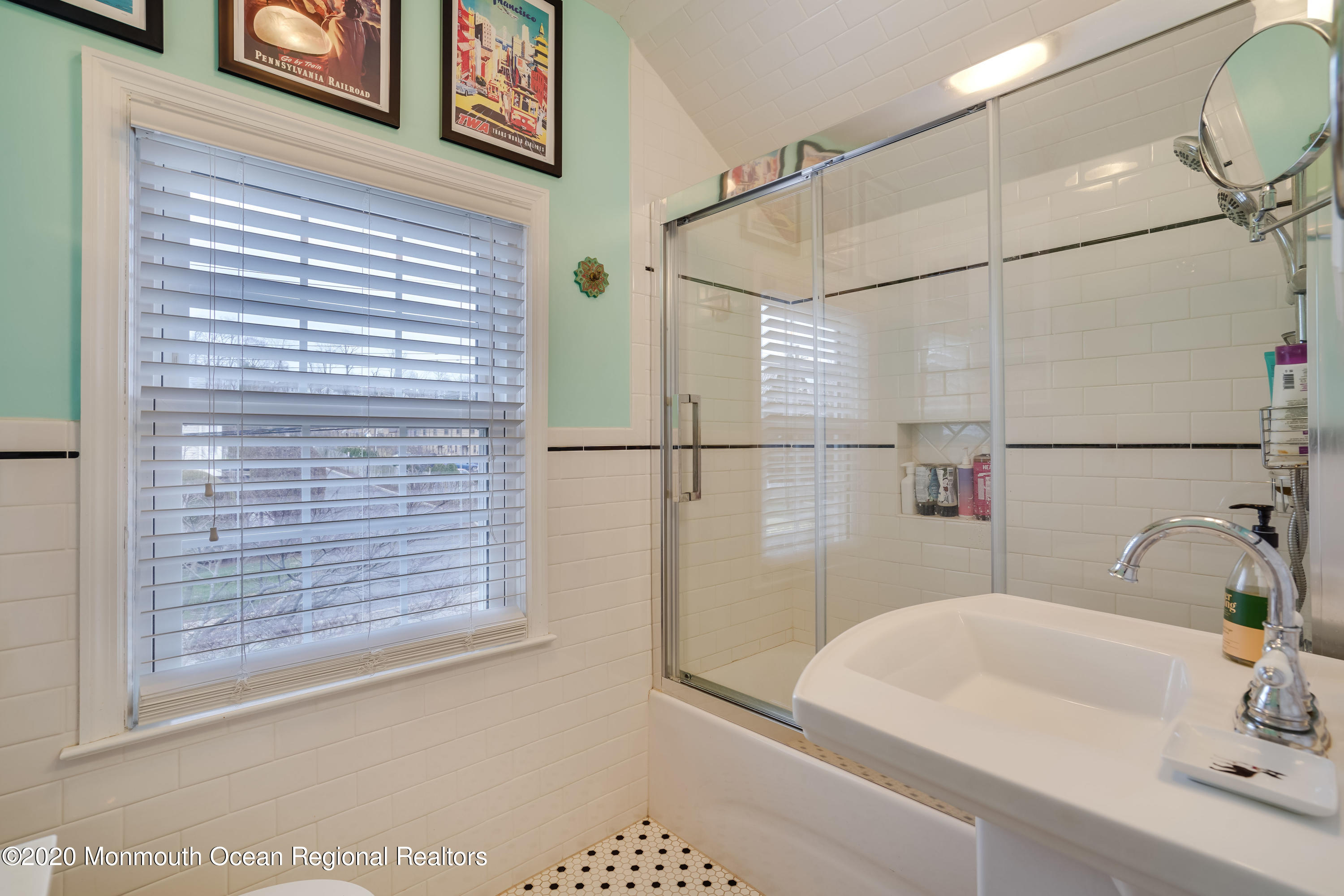 300 Spring Street Red Bank, NJ 07701 - Photo 20 of 25 a bathroom with a bathtub and a shower