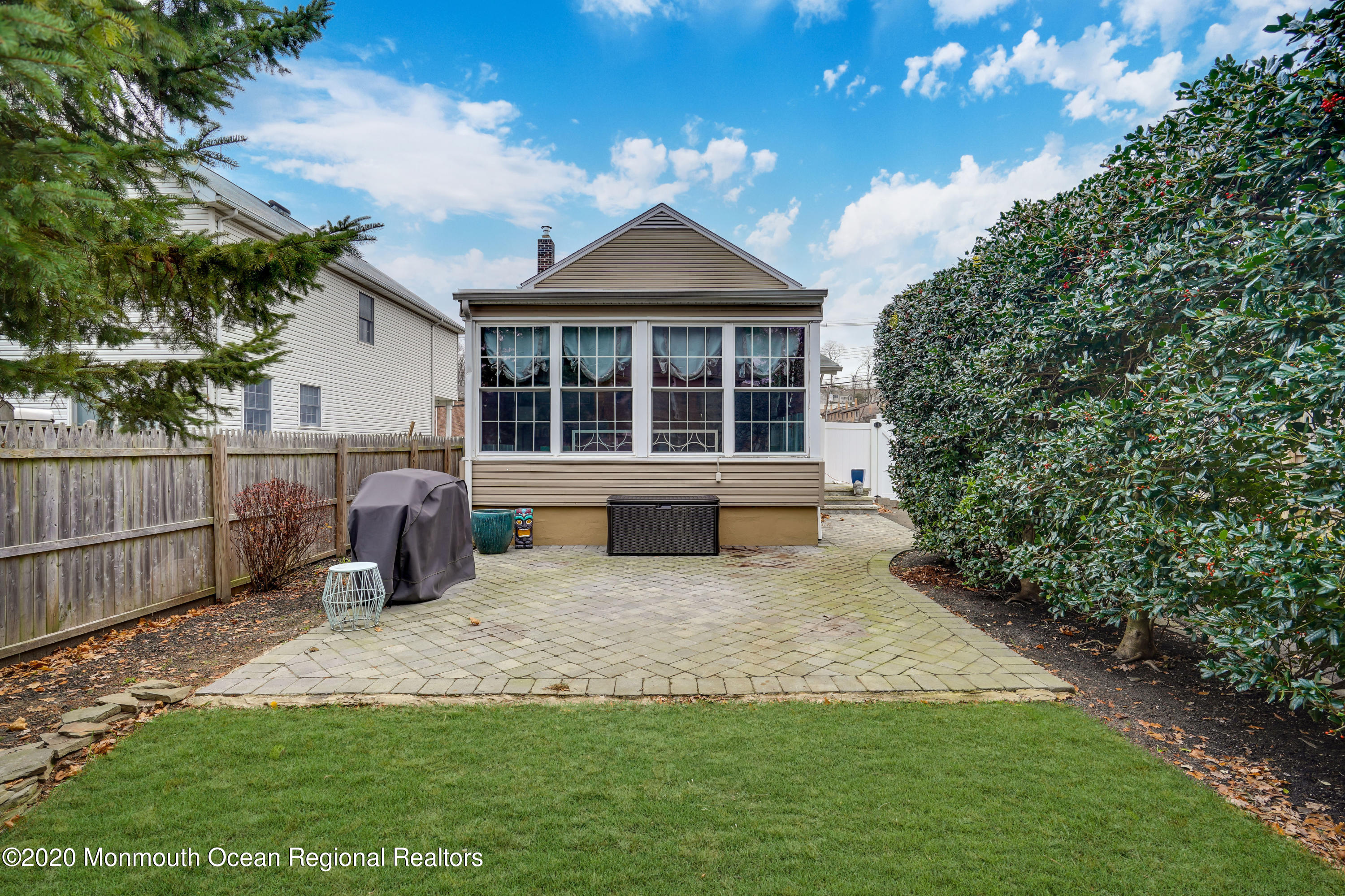 300 Spring Street Red Bank, NJ 07701 - Photo 25 of 25 a view of a house with a yard and sitting area