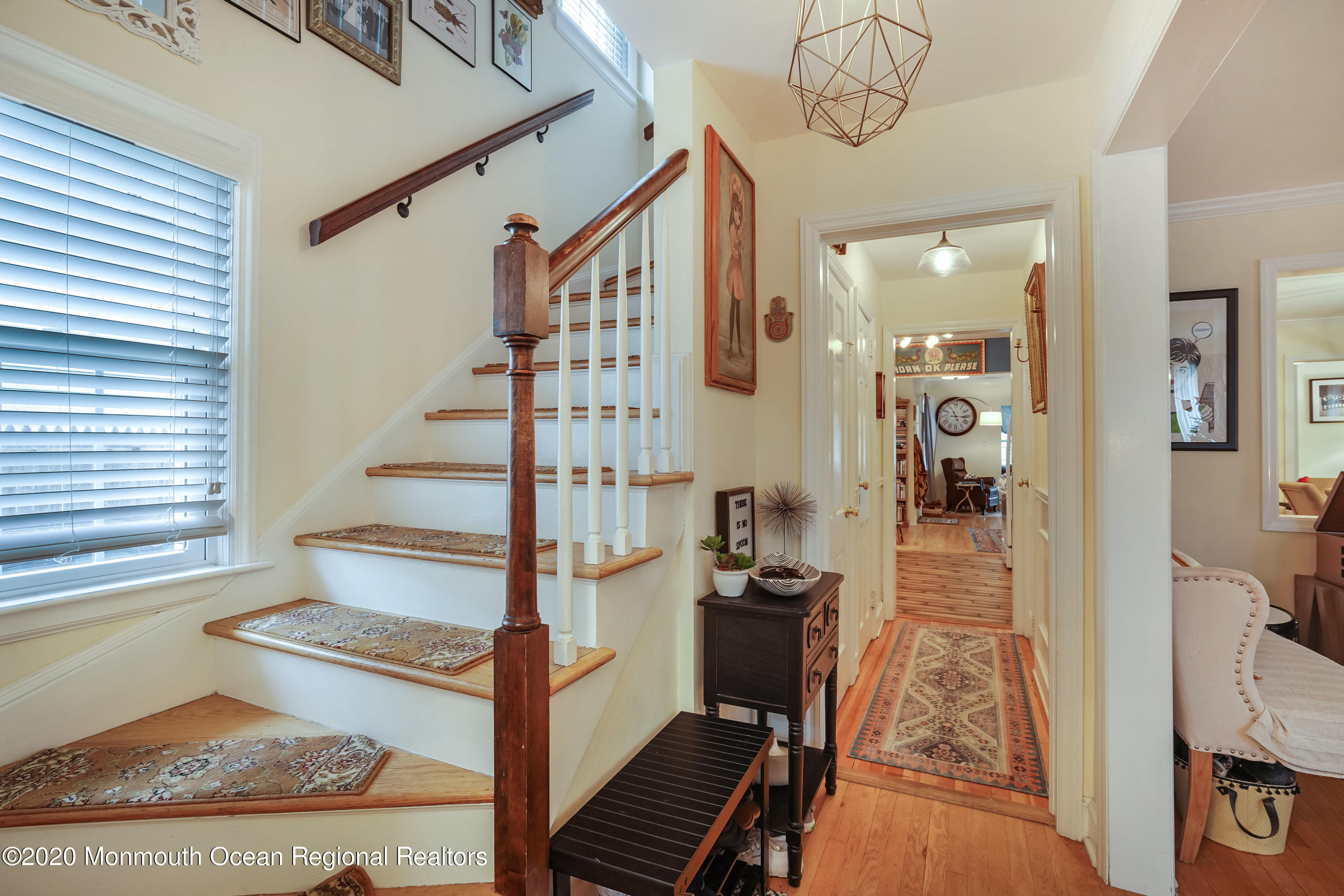 300 Spring Street Red Bank, NJ 07701 - Photo 4 of 25 a view of entryway livingroom and hall with wooden floor
