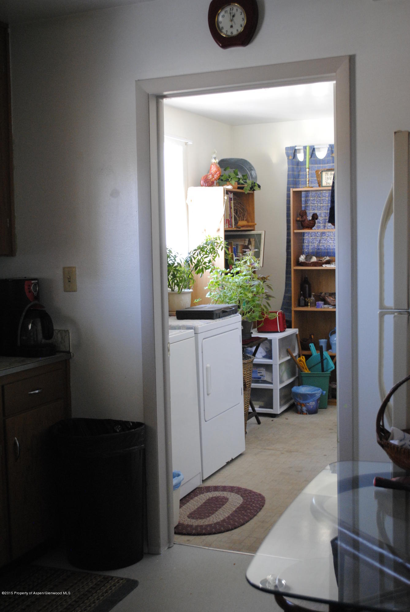 128 West 3rd Street Rifle, CO 81650 - Photo 11 of 16 a room with storage and utility