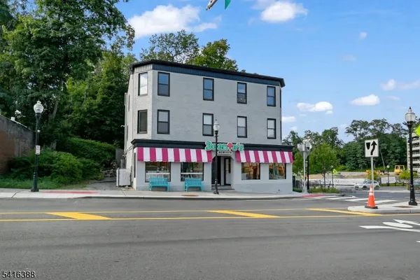 a view of street with houses