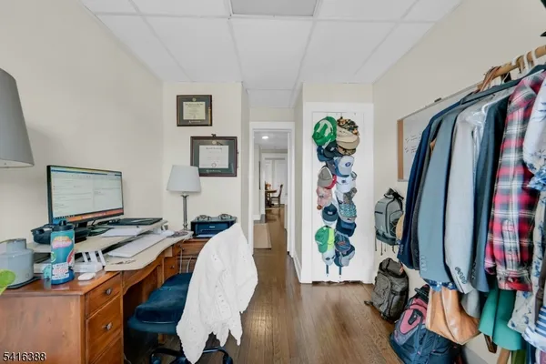 a view of a workspace with furniture and toys