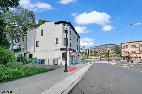 a front view of a building with street view